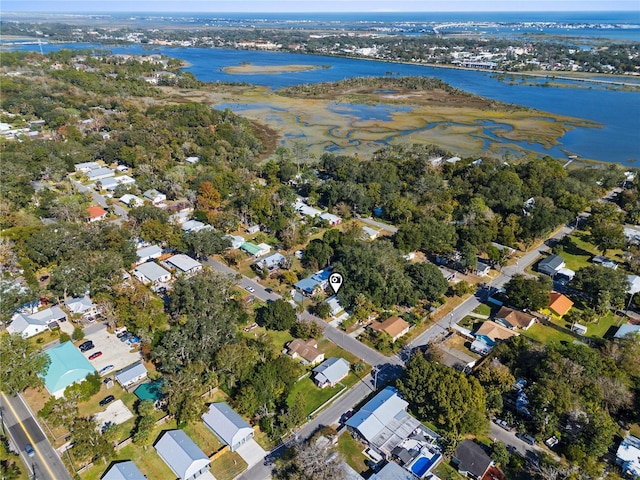 bird's eye view with a water view and a residential view