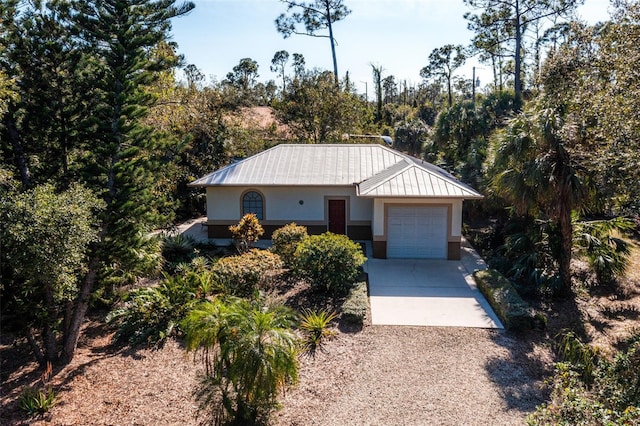 ranch-style home with a garage