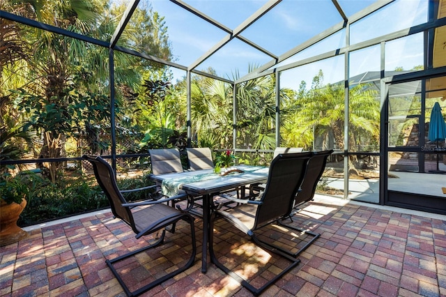 view of patio / terrace with glass enclosure