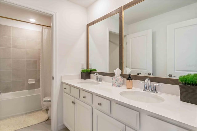 full bath featuring double vanity, toilet, shower / tub combo with curtain, and a sink