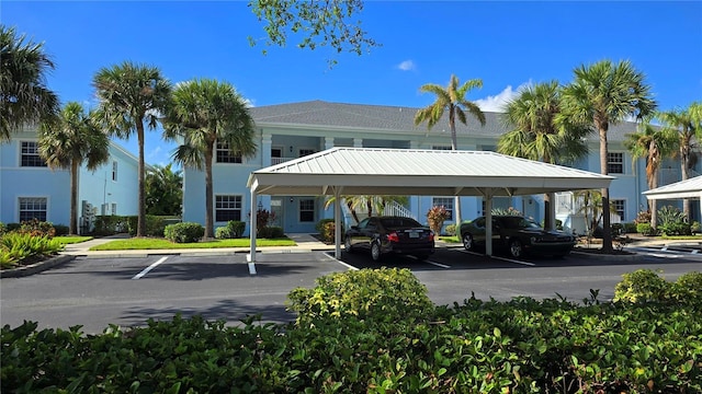 view of parking featuring a carport