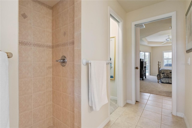 ensuite bathroom featuring ensuite bath, visible vents, tiled shower, tile patterned floors, and a raised ceiling