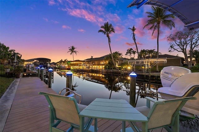 dock area with a water view