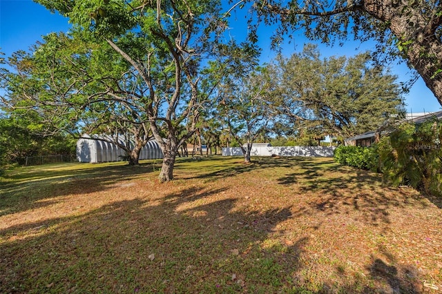 view of yard featuring fence