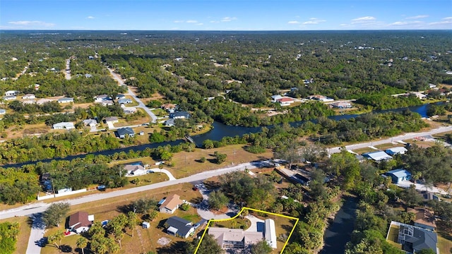 aerial view with a water view and a residential view