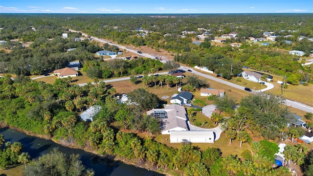 aerial view featuring a water view and a residential view