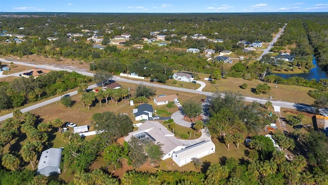 bird's eye view with a residential view and a water view