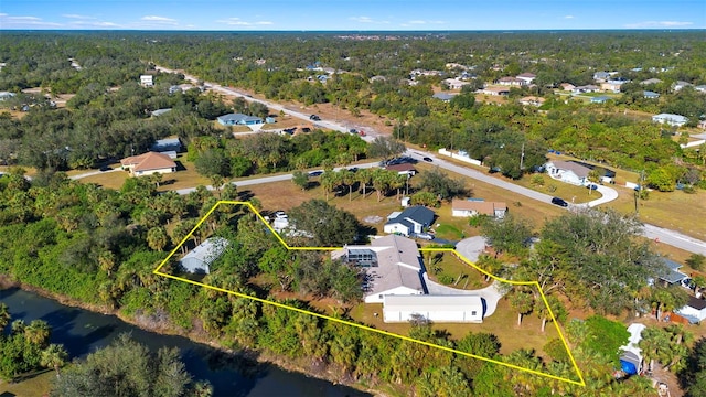 aerial view featuring a water view and a residential view