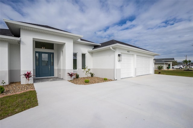 entrance to property featuring a garage