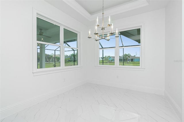 empty room with an inviting chandelier and crown molding