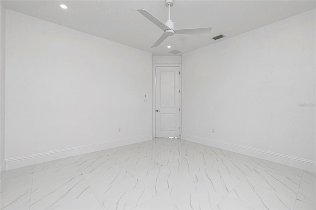 unfurnished room with ceiling fan