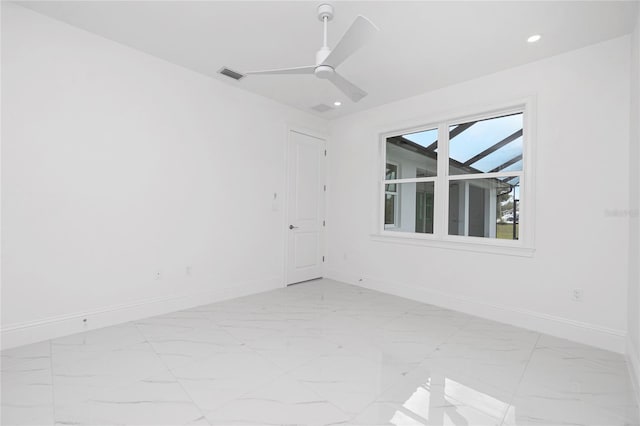 unfurnished room featuring ceiling fan