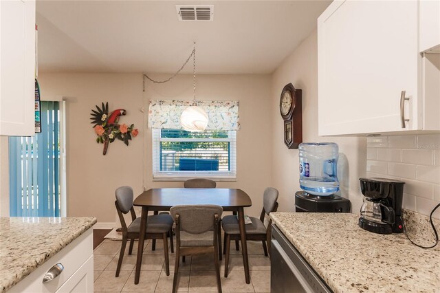 view of tiled dining area