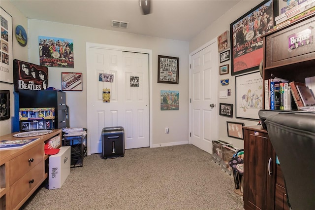 home office with light carpet