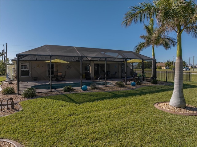 view of yard featuring glass enclosure