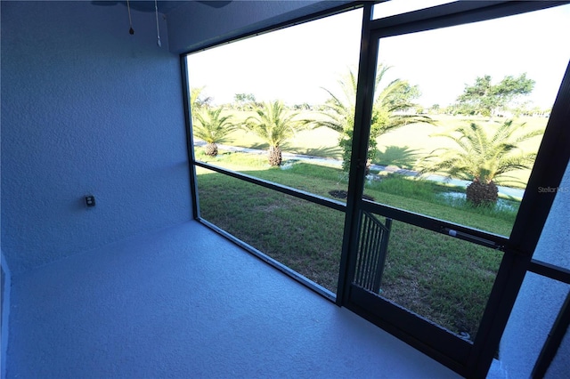 unfurnished sunroom with a wealth of natural light