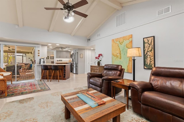 tiled living room featuring beam ceiling, high vaulted ceiling, and ceiling fan