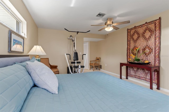 bedroom with ceiling fan and carpet floors