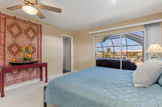 carpeted bedroom with access to outside and ceiling fan