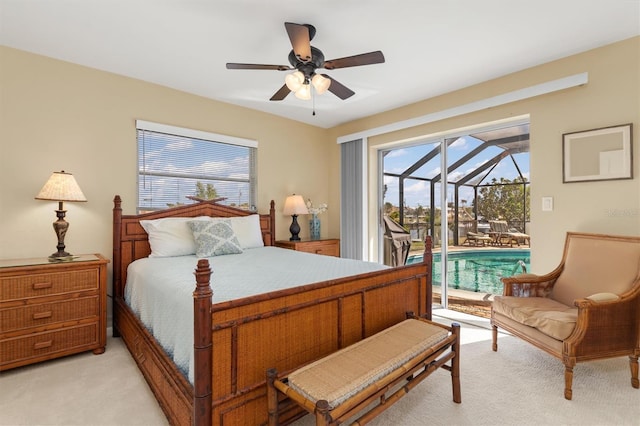 carpeted bedroom featuring ceiling fan and access to exterior