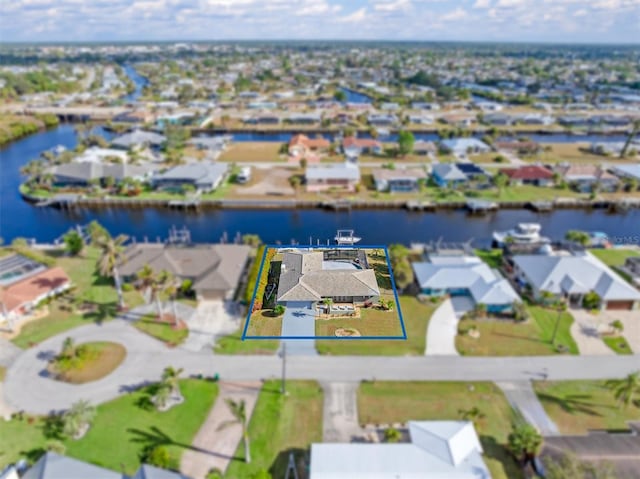 drone / aerial view featuring a water view