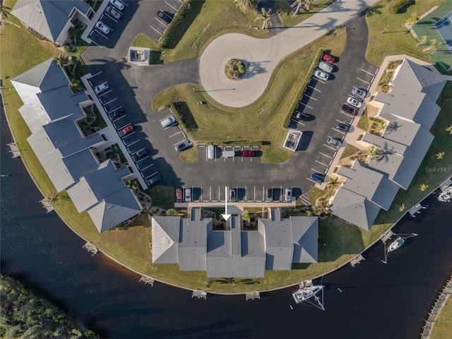 bird's eye view with a water view