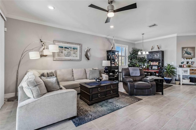 living room with ceiling fan and ornamental molding