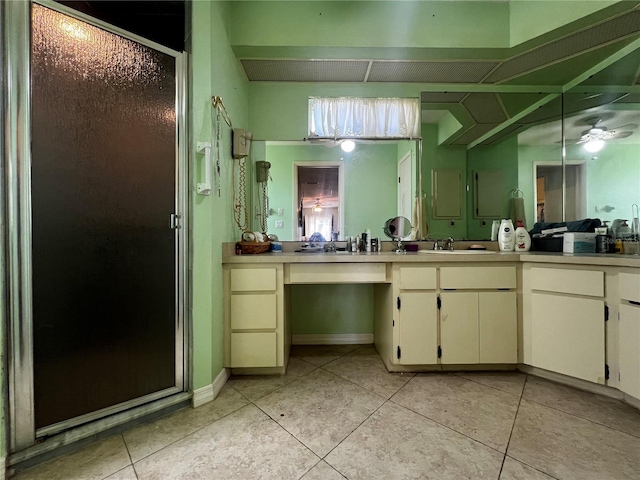 bathroom featuring tile patterned floors, ceiling fan, vanity, and walk in shower