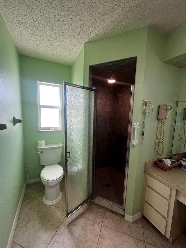 bathroom featuring toilet, tile patterned flooring, a textured ceiling, and walk in shower