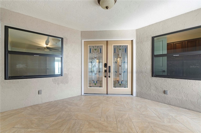 1600 W Marion Ave Unit 234, Punta Gorda, FL 33950 - property entrance featuring french doors and stucco siding