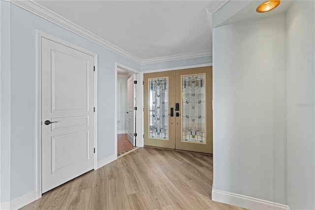 1600 W Marion Ave Unit 234, Punta Gorda, FL 33950 - foyer featuring french doors, light wood-style floors, and ornamental molding
