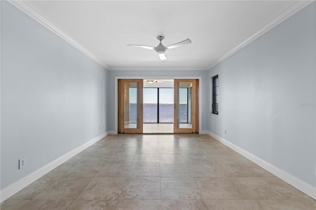 spare room with a water view, ceiling fan, and crown molding