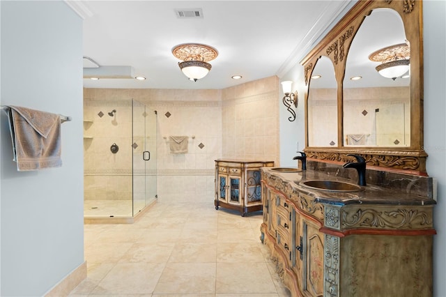 bathroom with vanity, walk in shower, and ornamental molding