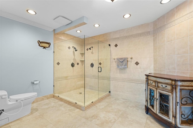 bathroom featuring toilet, an enclosed shower, ornamental molding, and tile walls