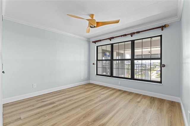 unfurnished room featuring a textured ceiling, light wood-type flooring, ceiling fan, and ornamental molding