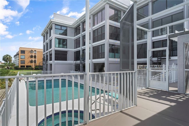 view of pool featuring a patio