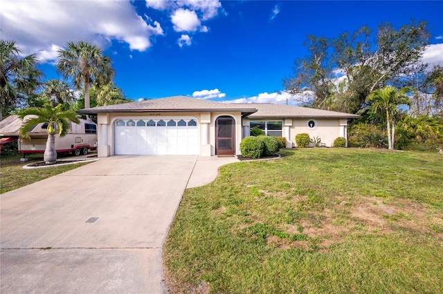 ranch-style home featuring a garage and a front yard