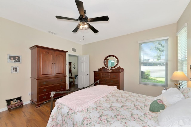 bedroom featuring light hardwood / wood-style floors and ceiling fan