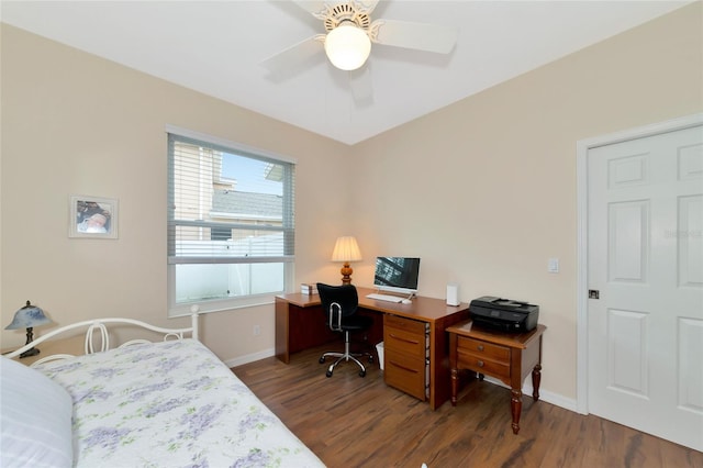 bedroom featuring dark hardwood / wood-style flooring and ceiling fan