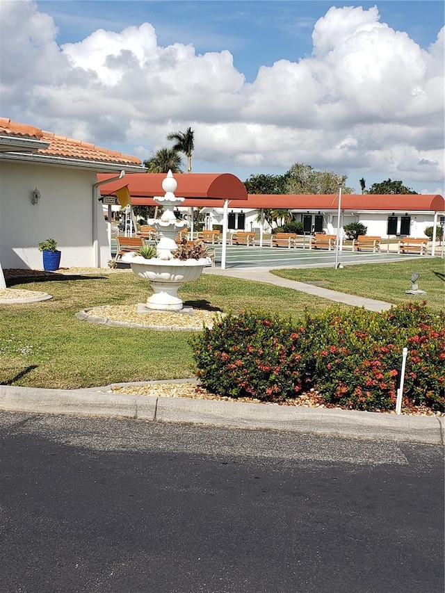 view of community with a yard