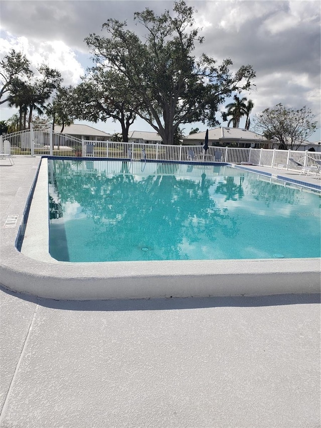 community pool with fence