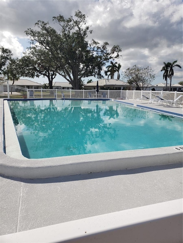 community pool with fence
