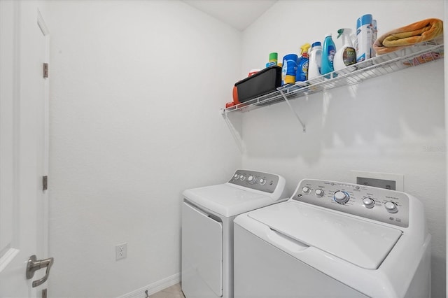 laundry area featuring washing machine and dryer