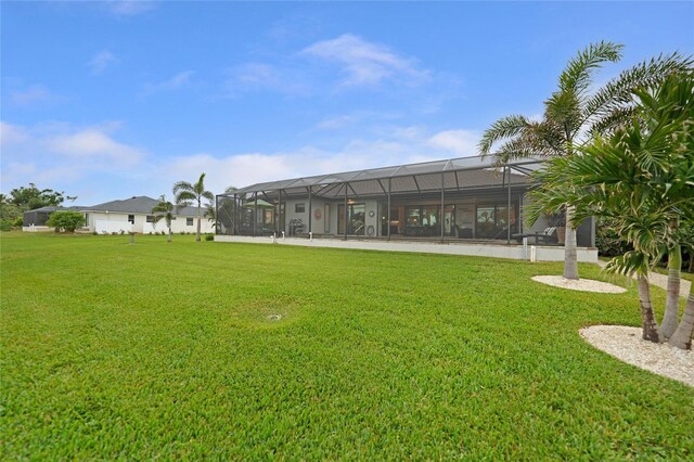 view of yard featuring glass enclosure