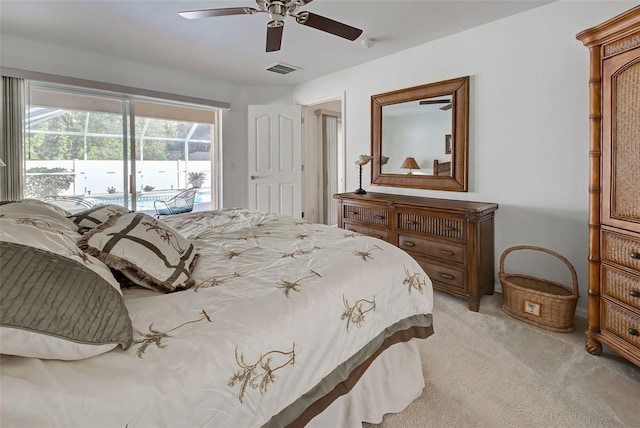 carpeted bedroom featuring access to exterior and ceiling fan