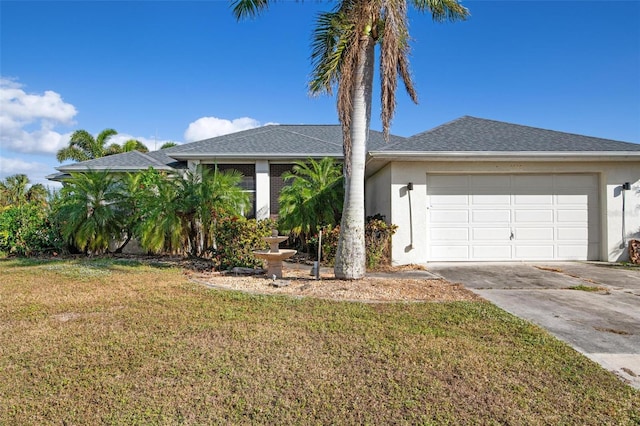 ranch-style home with a front yard and a garage