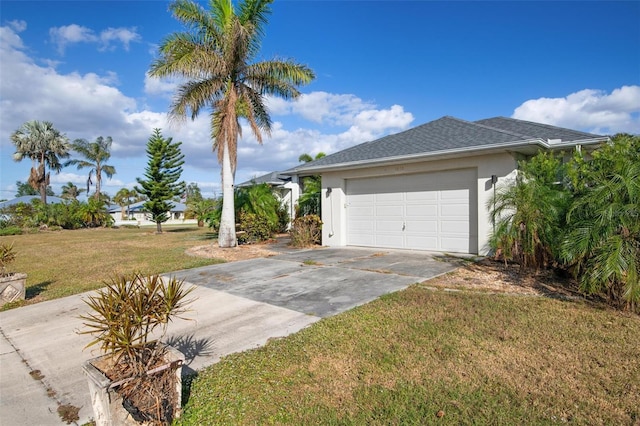 view of property exterior with a garage and a lawn