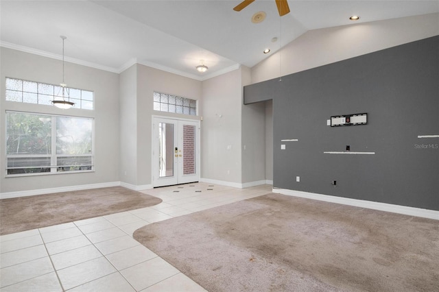 tiled foyer featuring french doors, high vaulted ceiling, ceiling fan, and crown molding