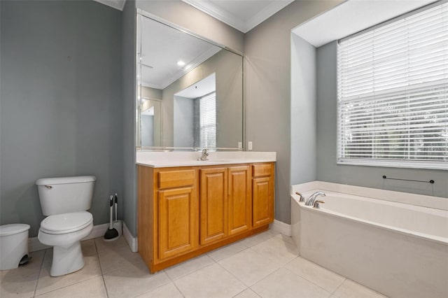 bathroom with tile patterned floors, a bathing tub, crown molding, and vanity