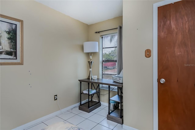 office area featuring light tile patterned flooring